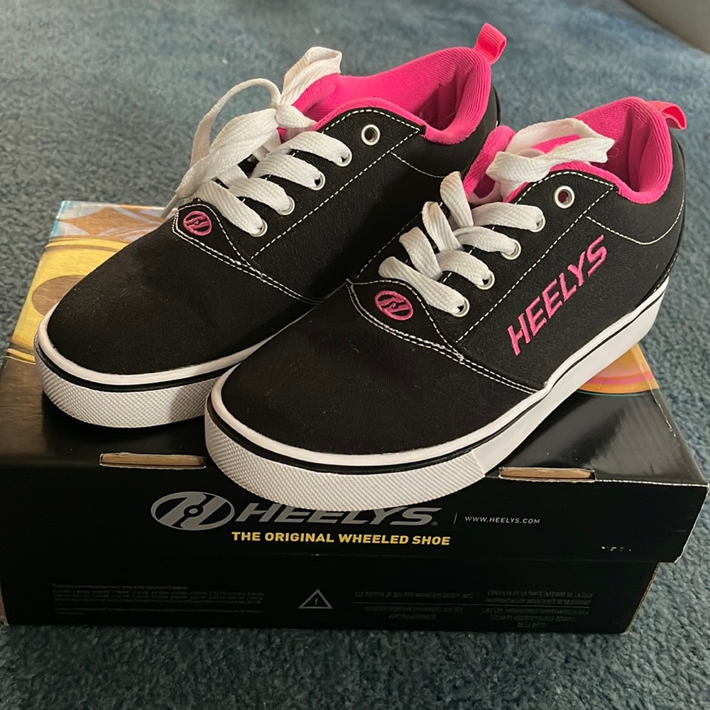 Heels like new. Black with Pink embroidery.